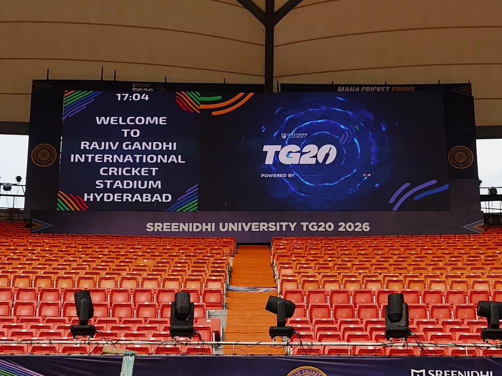 LED screen with animated blue graphic transitioning event content